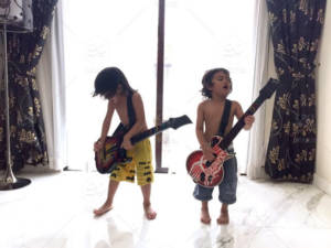 two-boys-playing-guitar