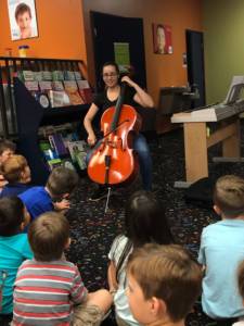 teacher leading cello classes in Miami