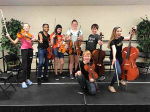 students participating in viola lessons in Miami