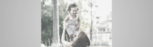 mom playing with baby