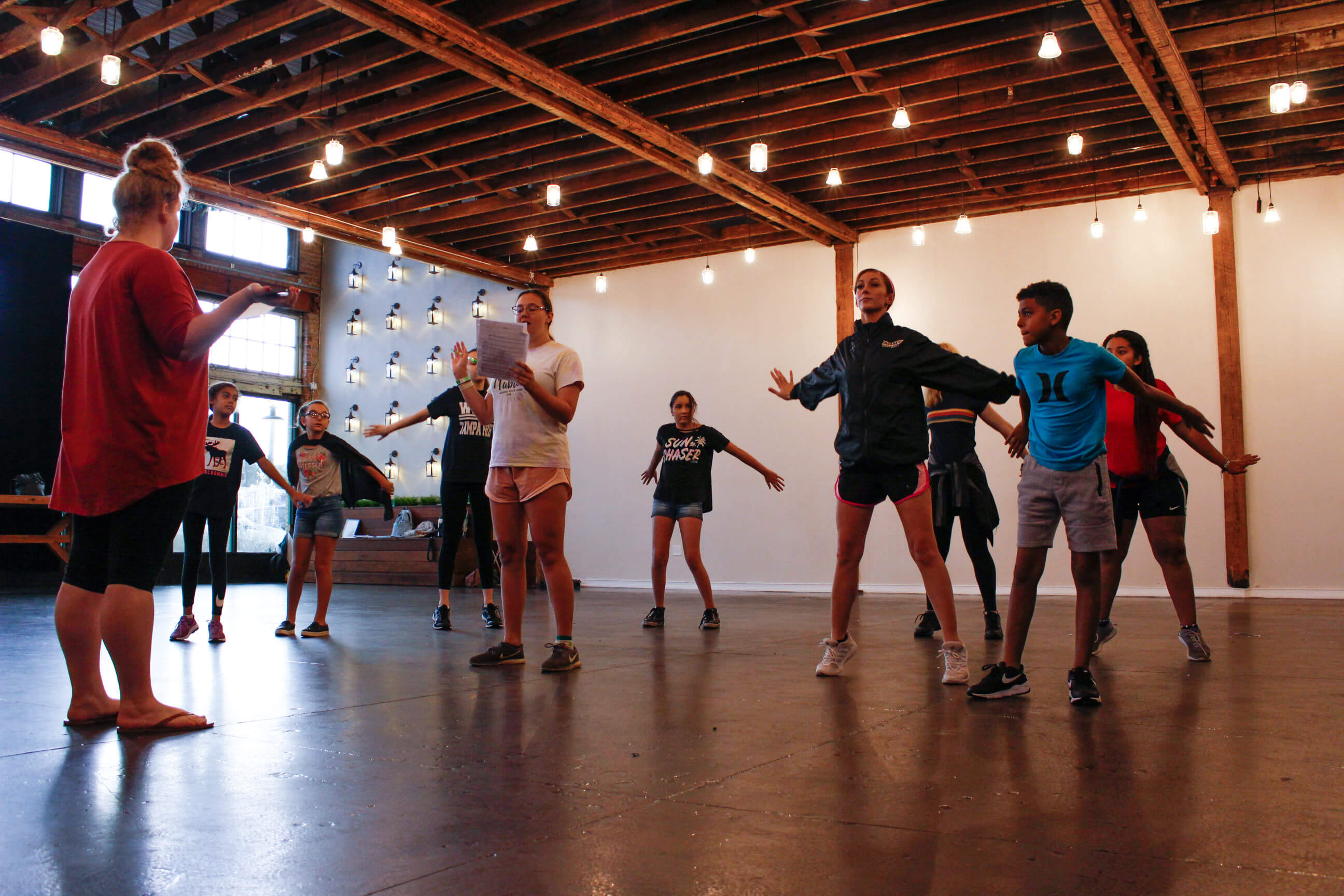 happy students participating in musical theater classes in Tampa